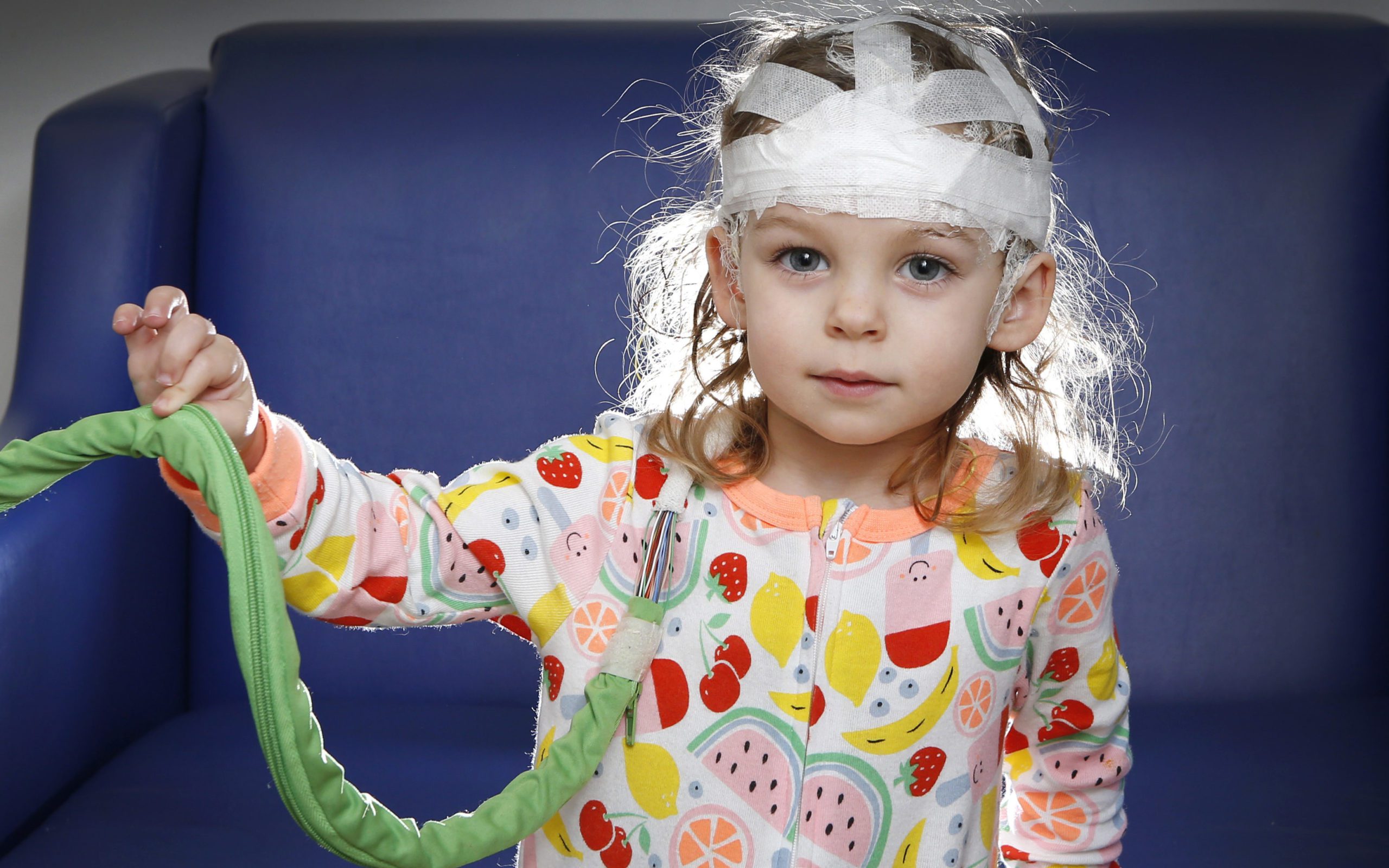 Piper, aged 2, with electrodes taped to her head