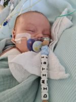 Dimitri sleeping in his hospital cot
